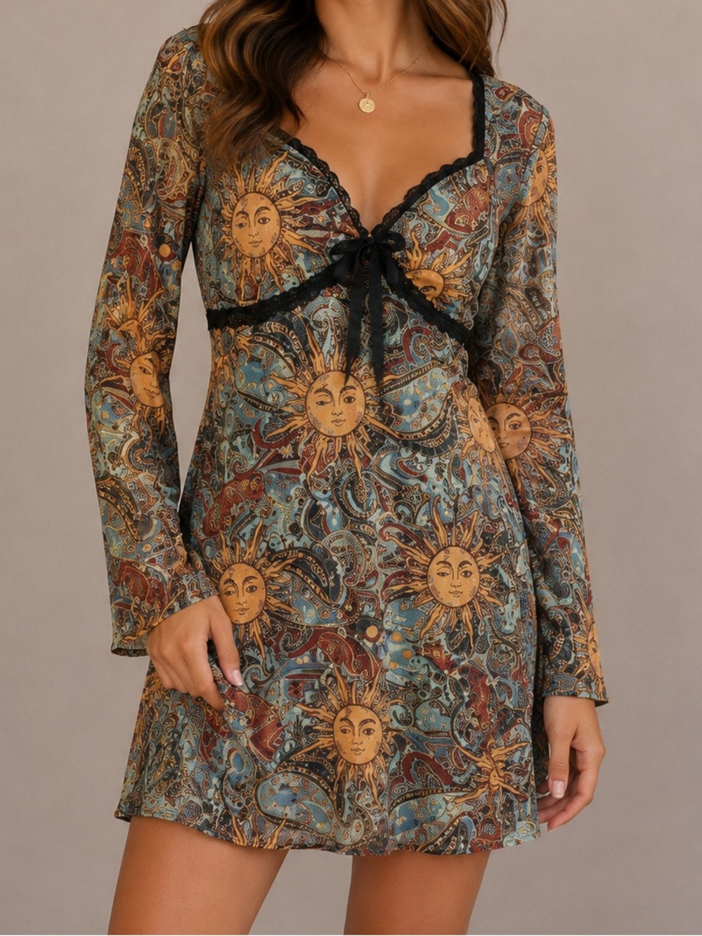 retro-style mini dress featuring a celestial sun and paisley print 3x
